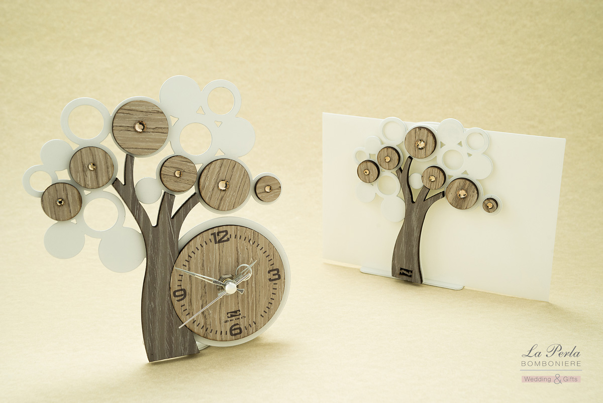 Orologio e Portadocumenti Albero della Vita in metallo e legno intagliati al laser Made in Italy.